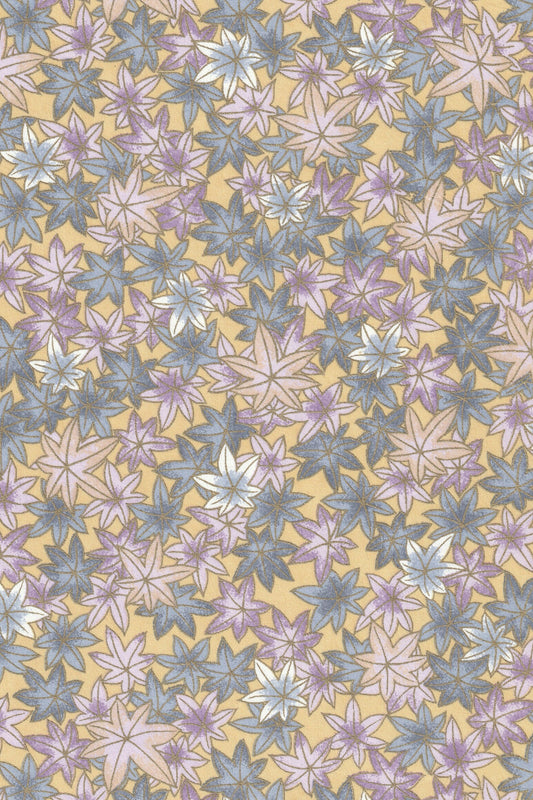 chiyogami paper with pattern of multicolored flowers on a yellow background