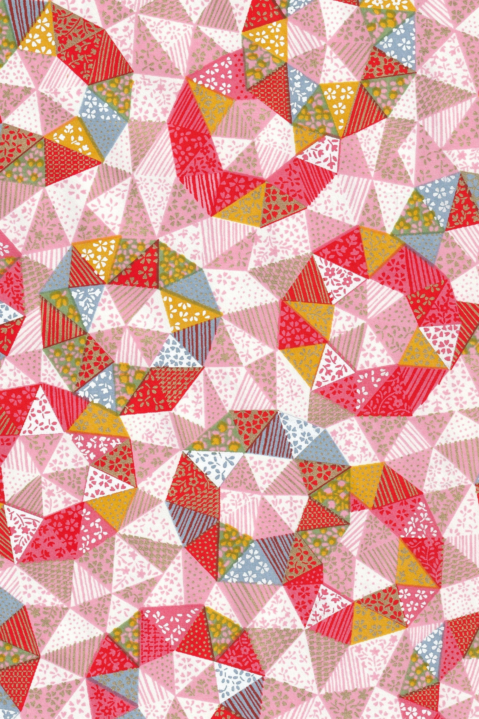 Colorful geometric triangle pattern on a chiyogami paper background