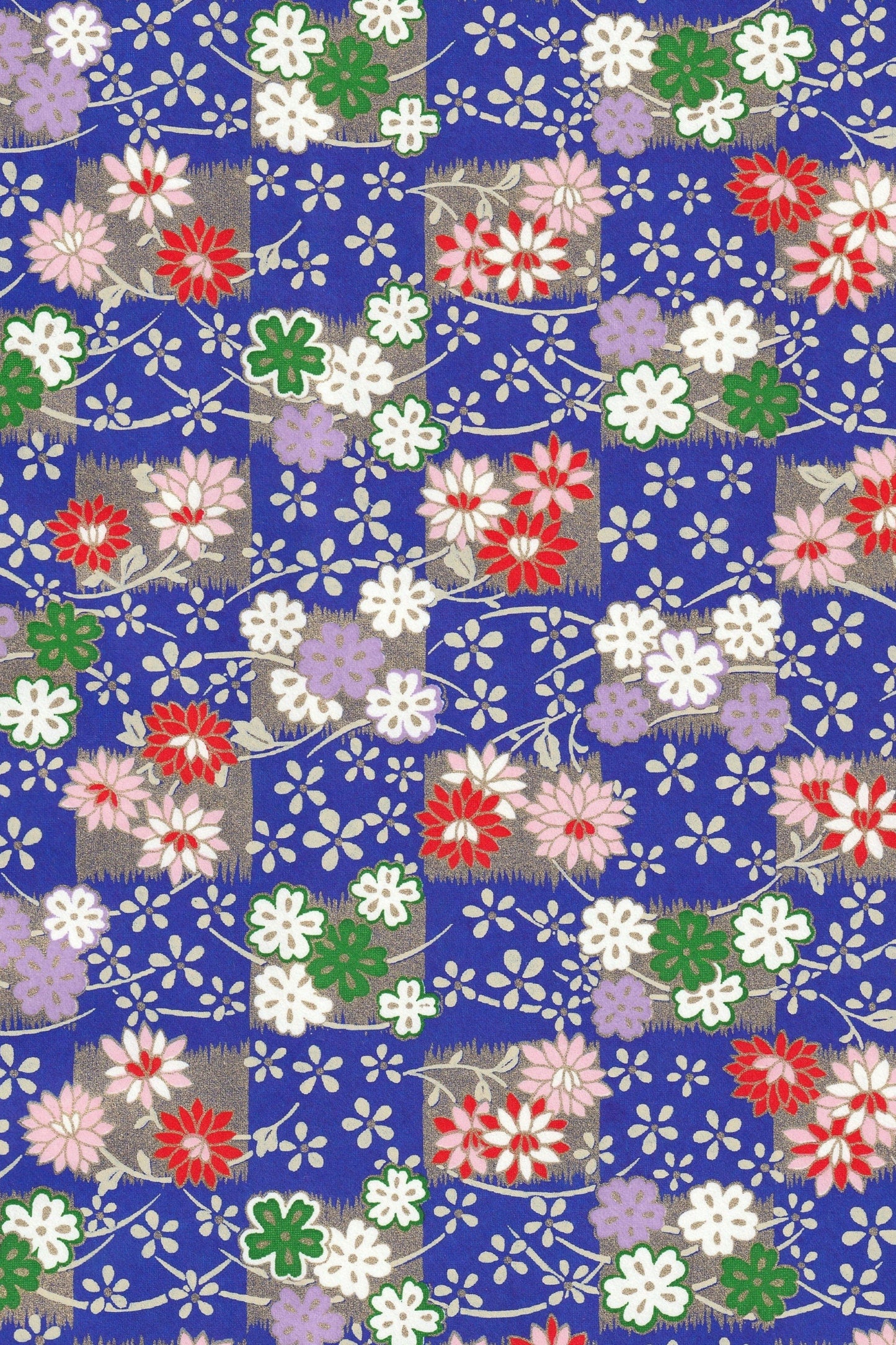 Floral patterned chiyogami paper with a blue background