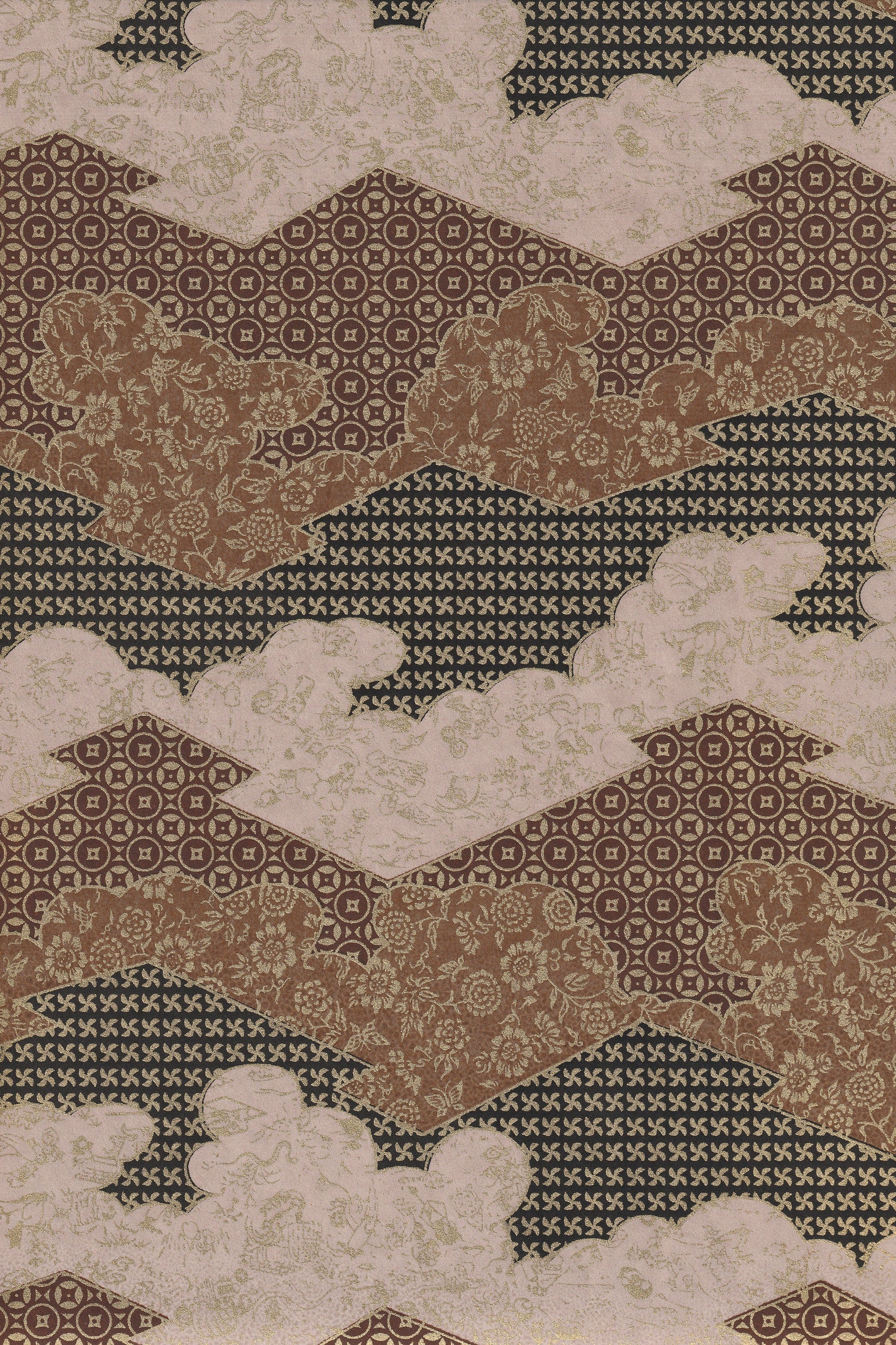 Patterned rug with geometric and floral designs in brown, beige, and green.