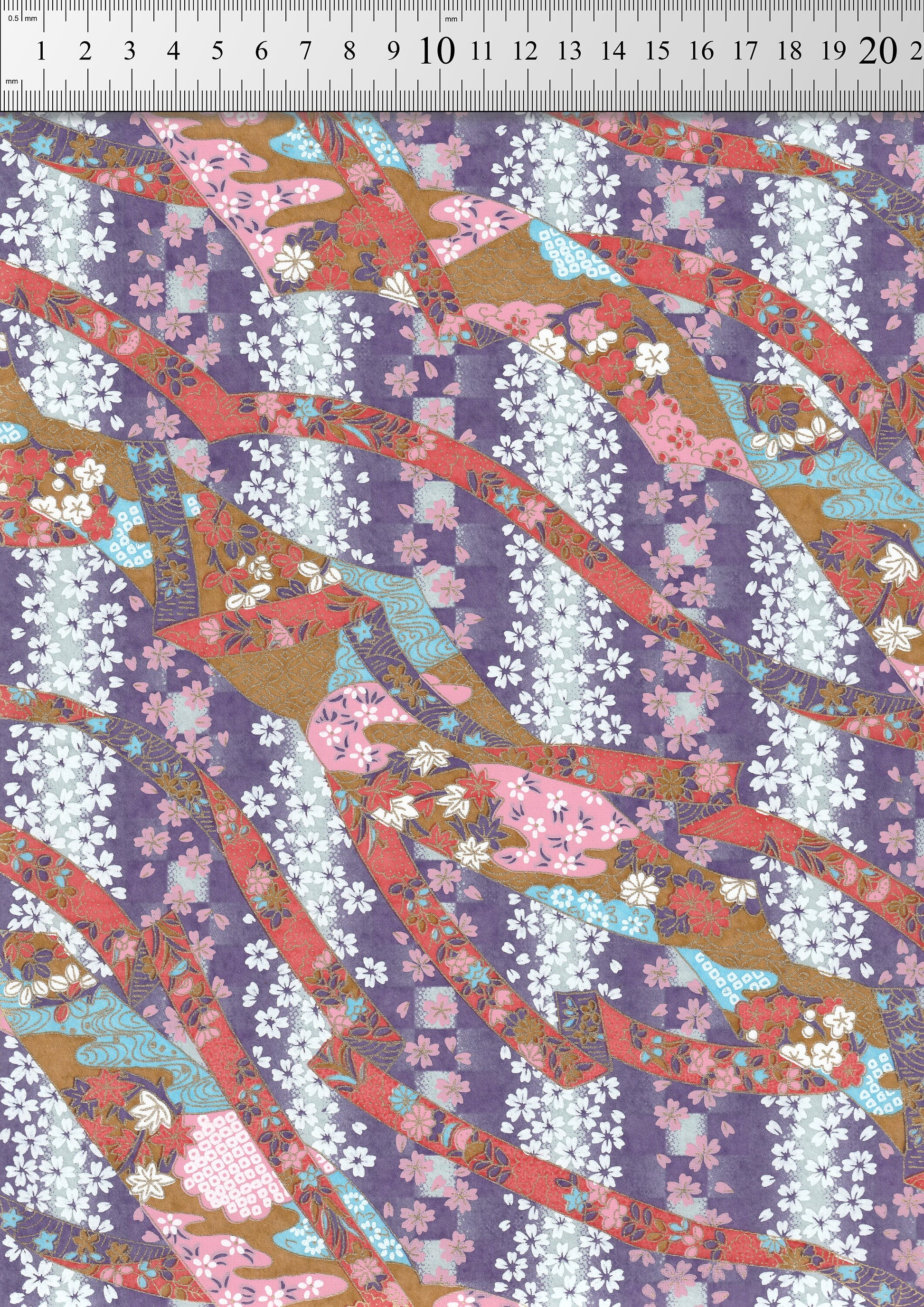 Colorful floral patterned  chiyogami paper with a ruler at the top