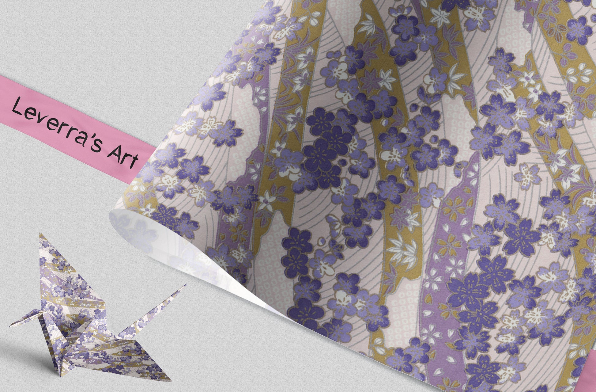 Floral patterned paper with a pink strip and origami crane on a light gray background, featuring 'Leverra's Art' branding.