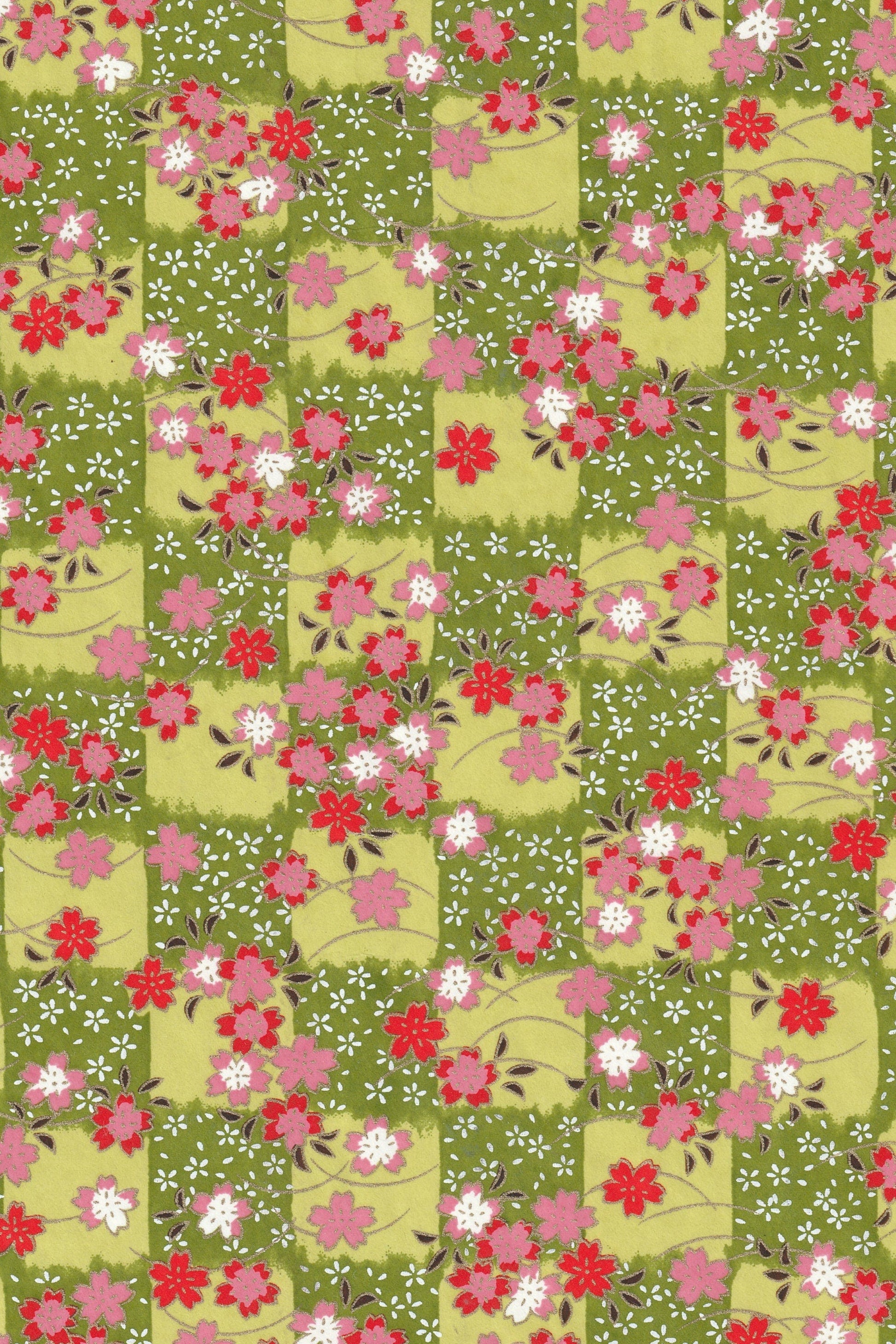 Floral pattern with pink and red flowers on a green background