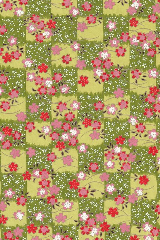 Floral pattern with pink and red flowers on a green background