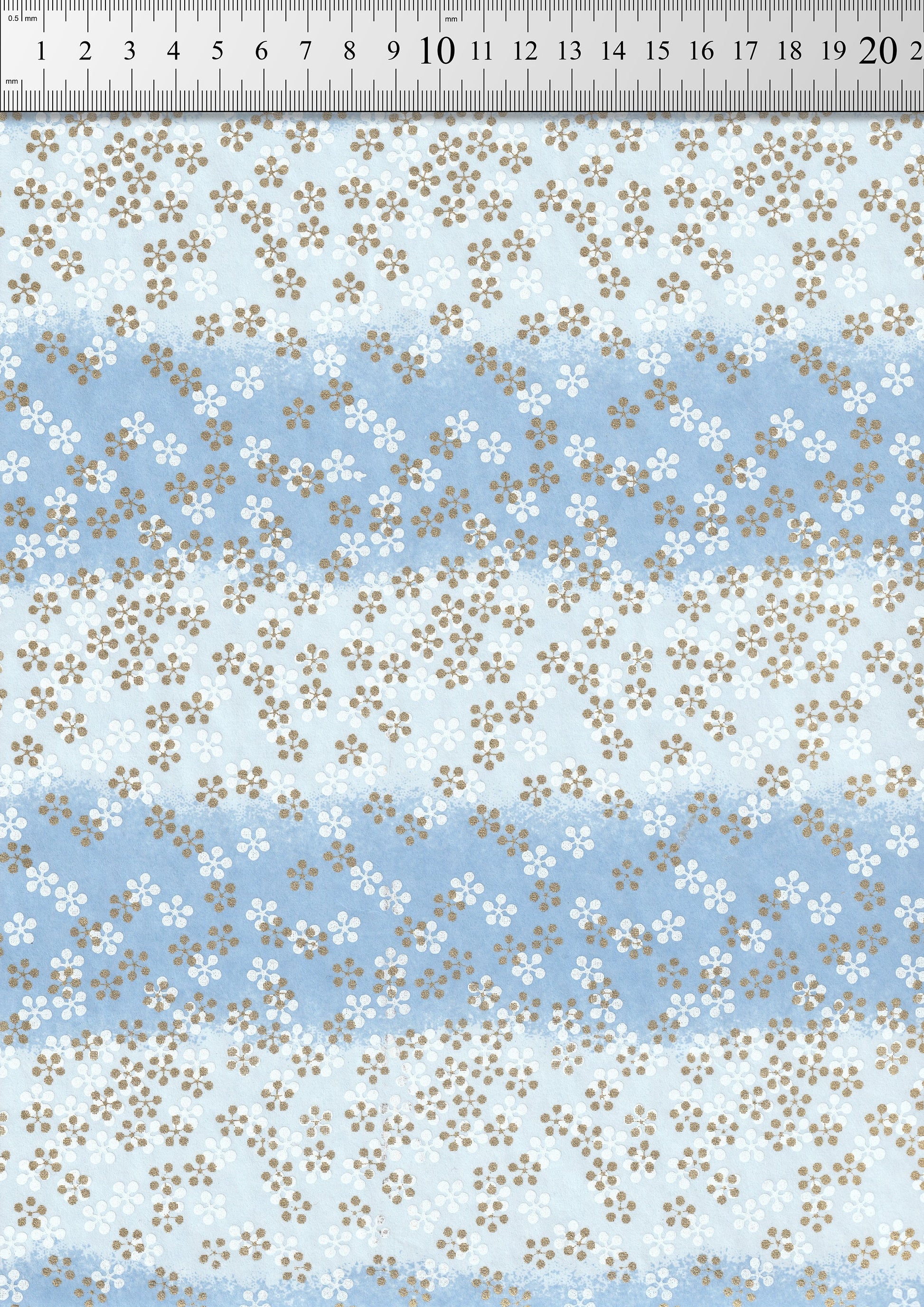 Floral pattern chiyogami paper swatch with a ruler at the top