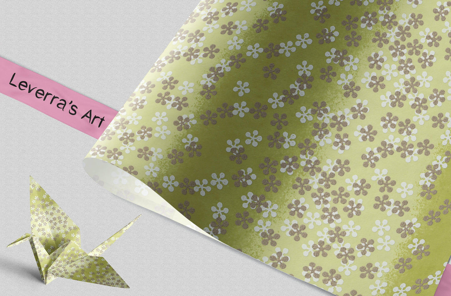 Floral-patterned paper with an origami crane on a gray background, featuring 'Leverra's Art' branding.