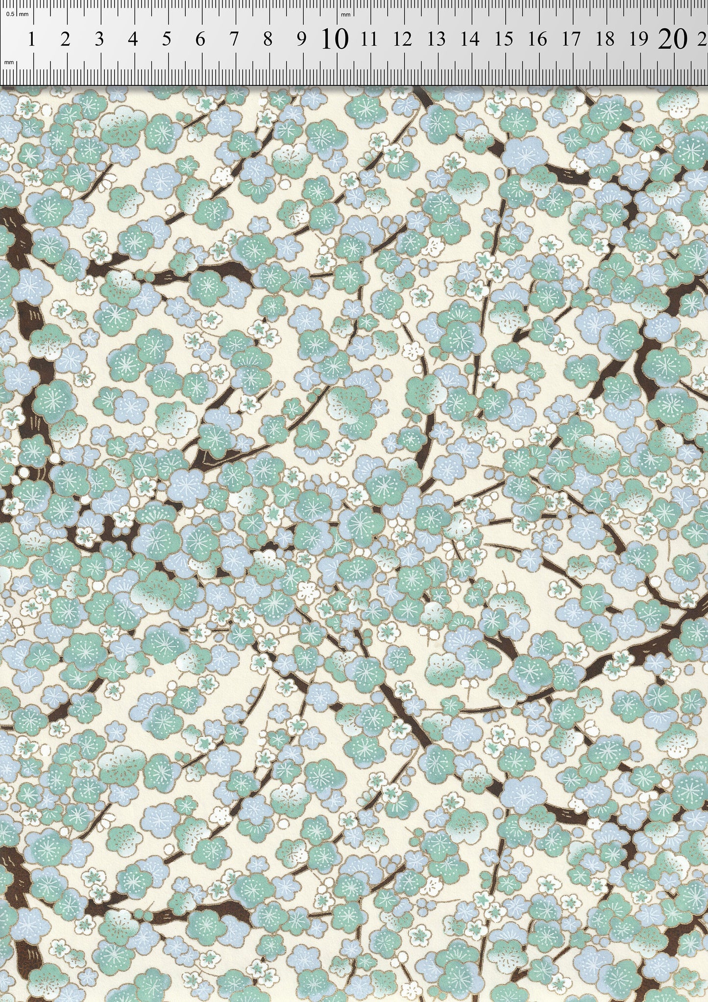 Patterned chiyogami paper with a ruler at the top for scale