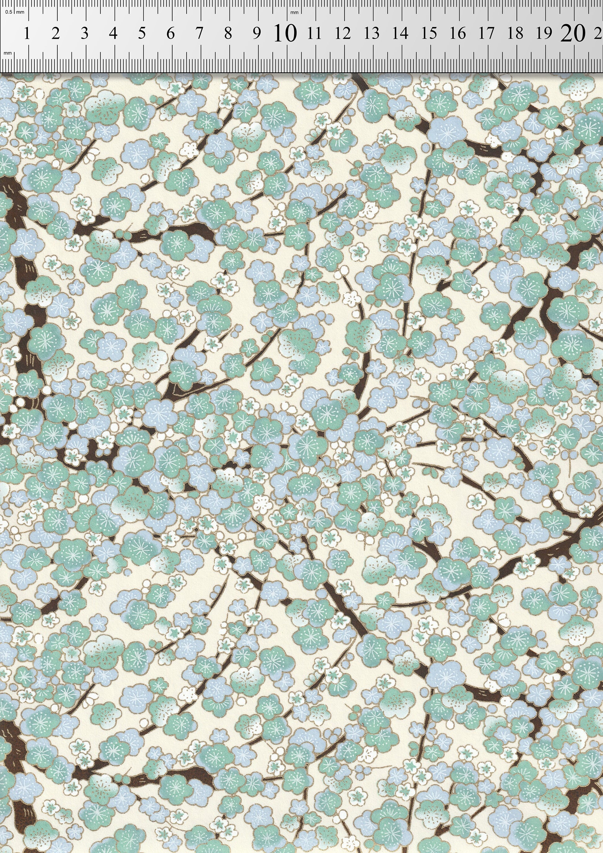 Patterned chiyogami paper with a ruler at the top for scale