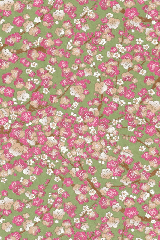 Chiyogami paper with Floral pattern with pink and white flowers on a green background