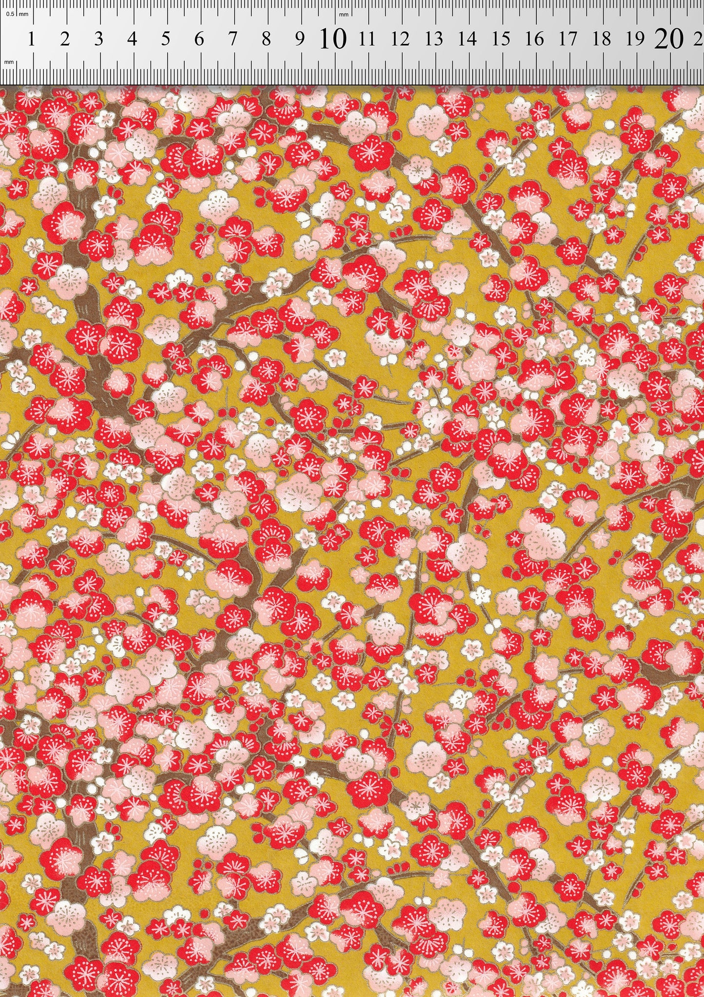Floral pattern with red and pink flowers on a yellow background