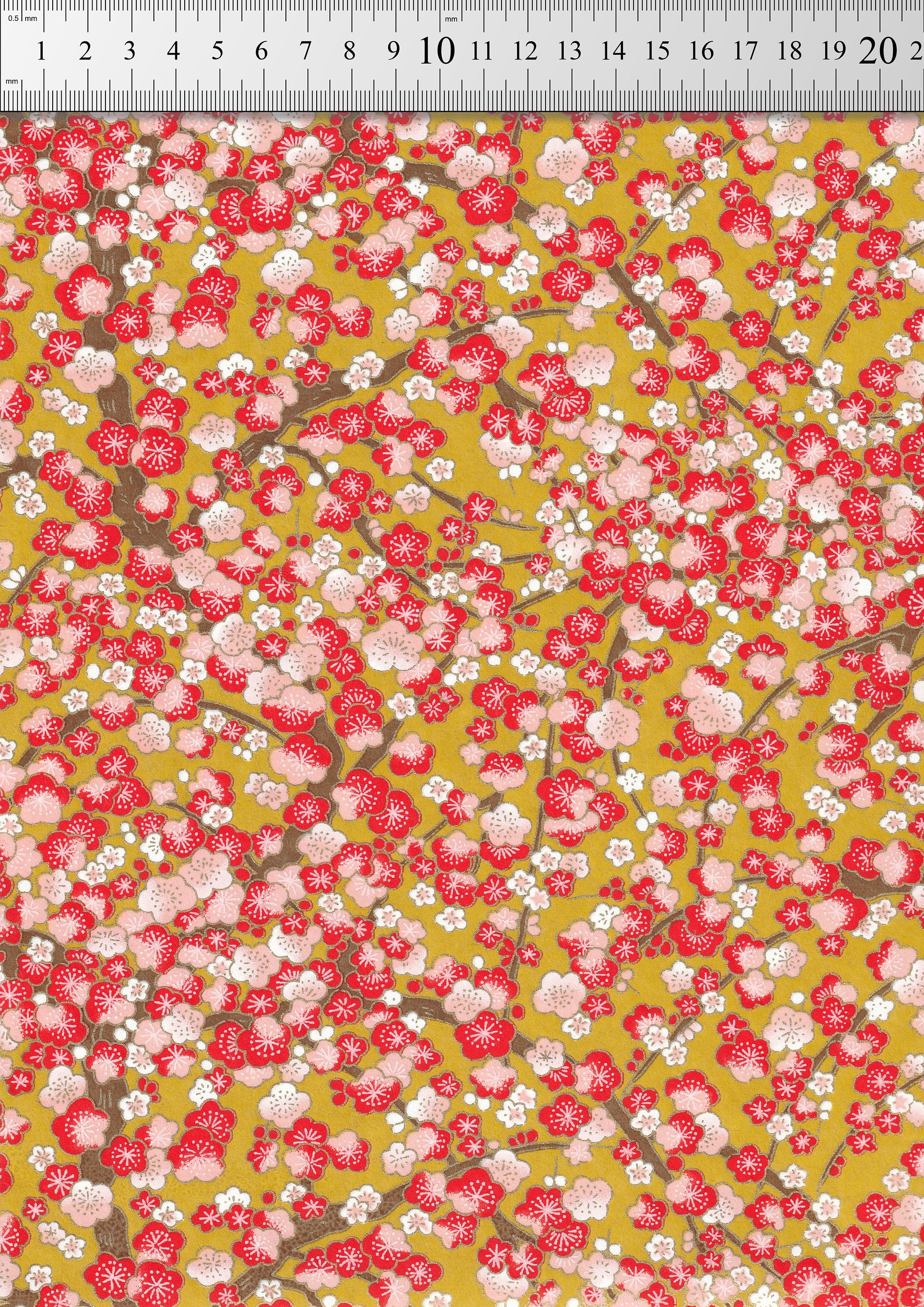 Floral pattern with red and pink flowers on a yellow background