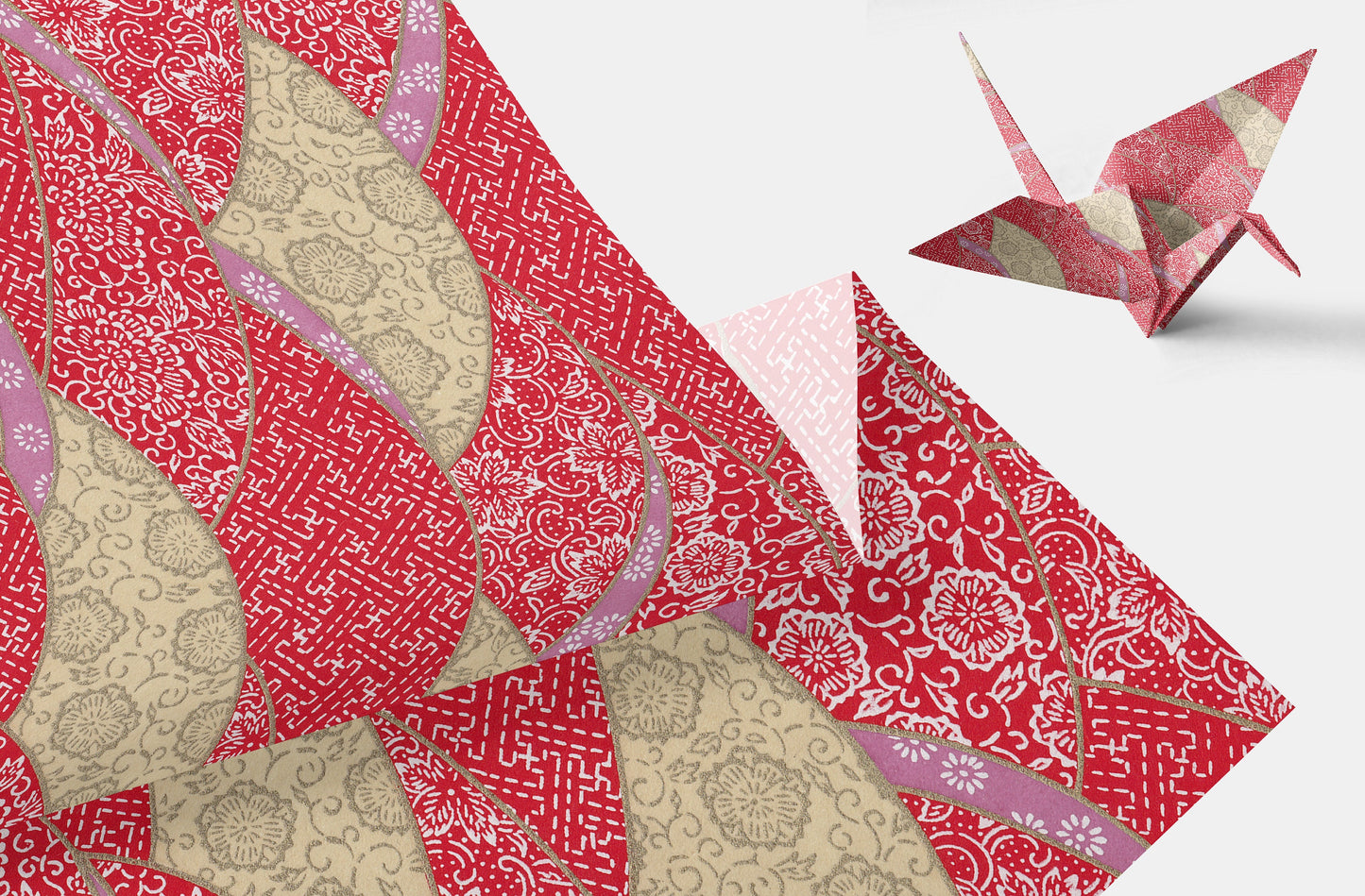 Patterned paper with a red and beige design and a folded paper crane on a light gray background.