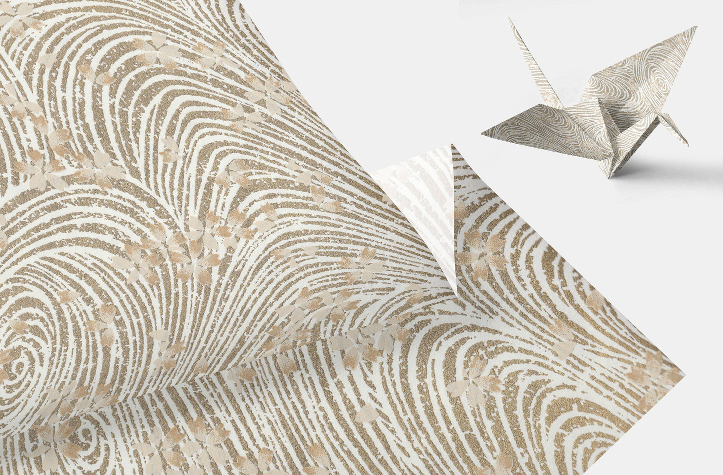 Decorative chiyogami paper with a textured pattern and a folded paper crane on a white background