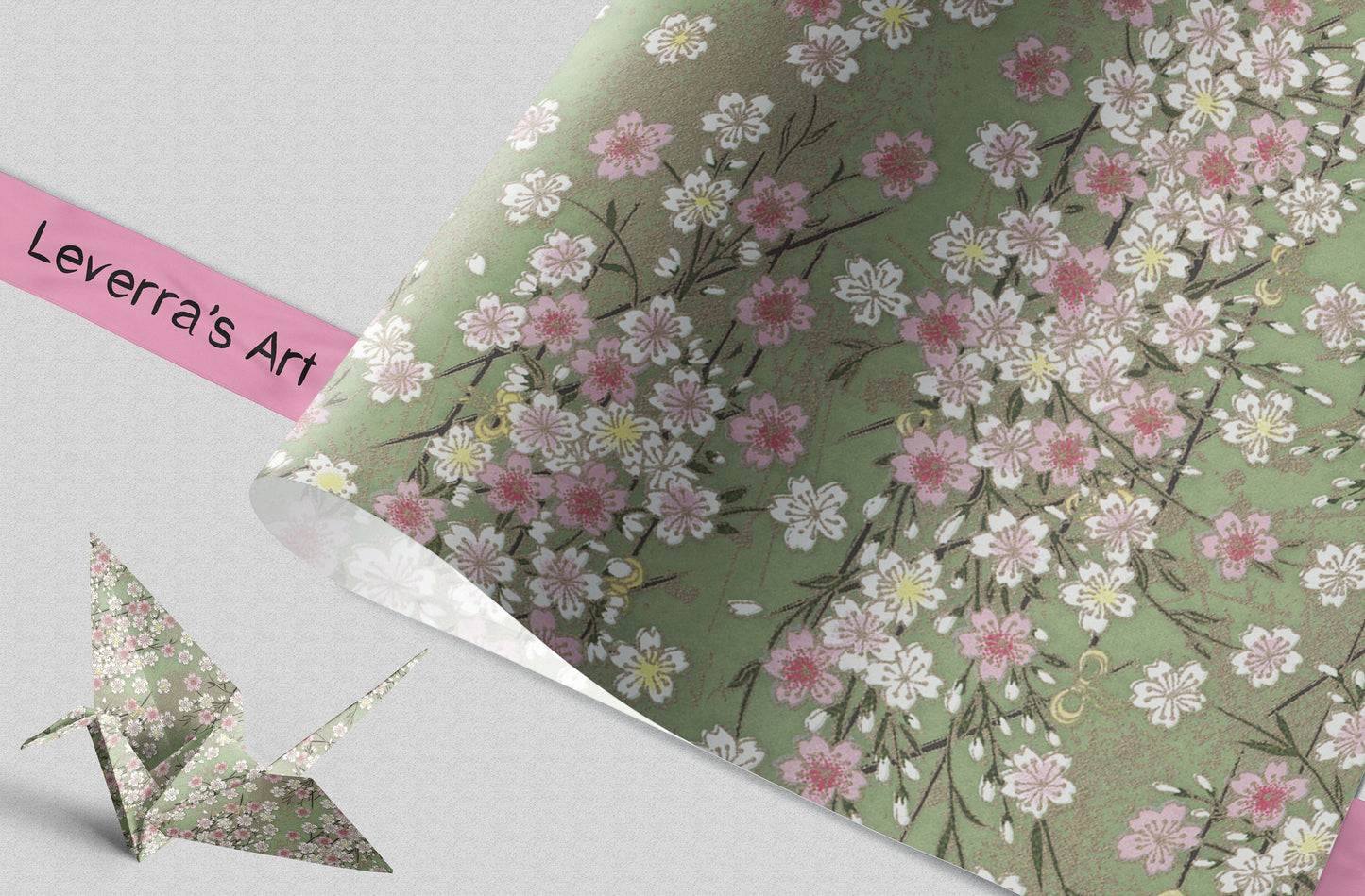Floral patterned paper with a pink origami crane on a light gray background, featuring 'Leverra's Art' branding.