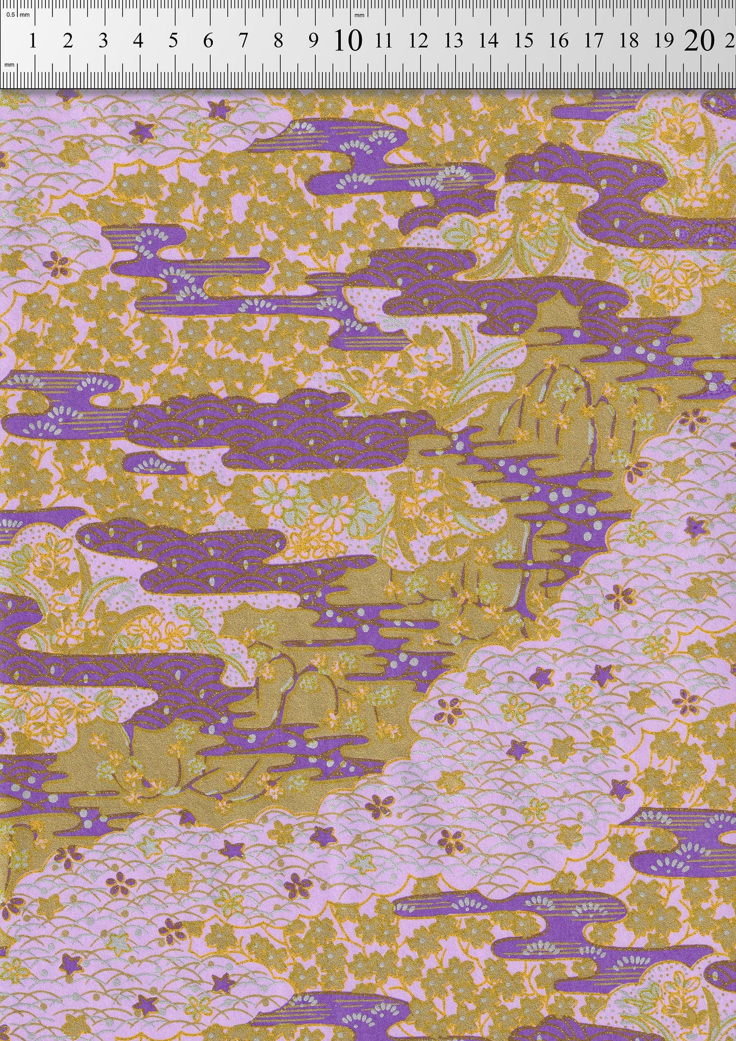 Fabric with purple and green abstract pattern on a white background