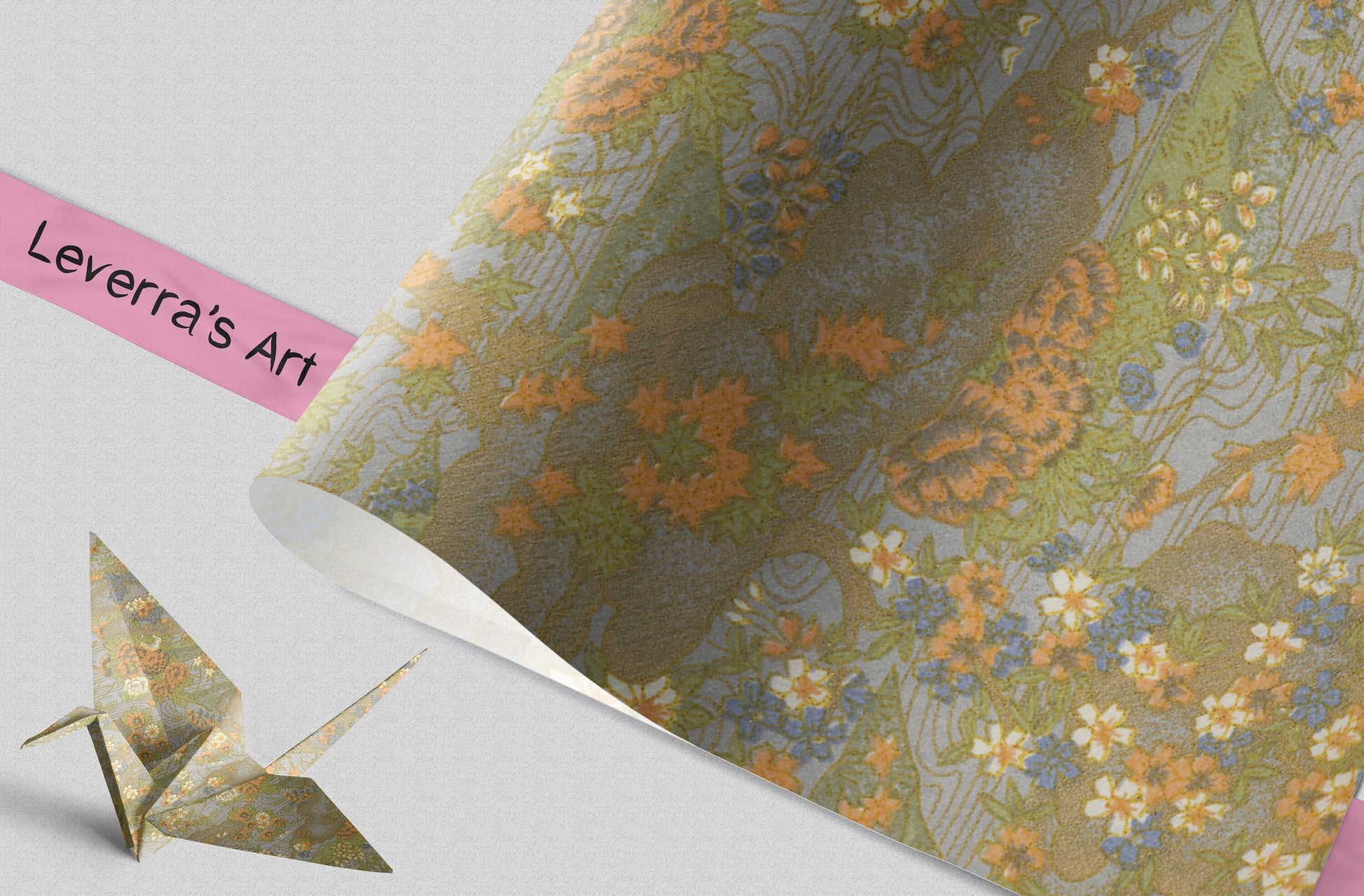 floral-patterned chiyogami paper and an origami crane on a light gray background featuring a "Leverra's Art" label.