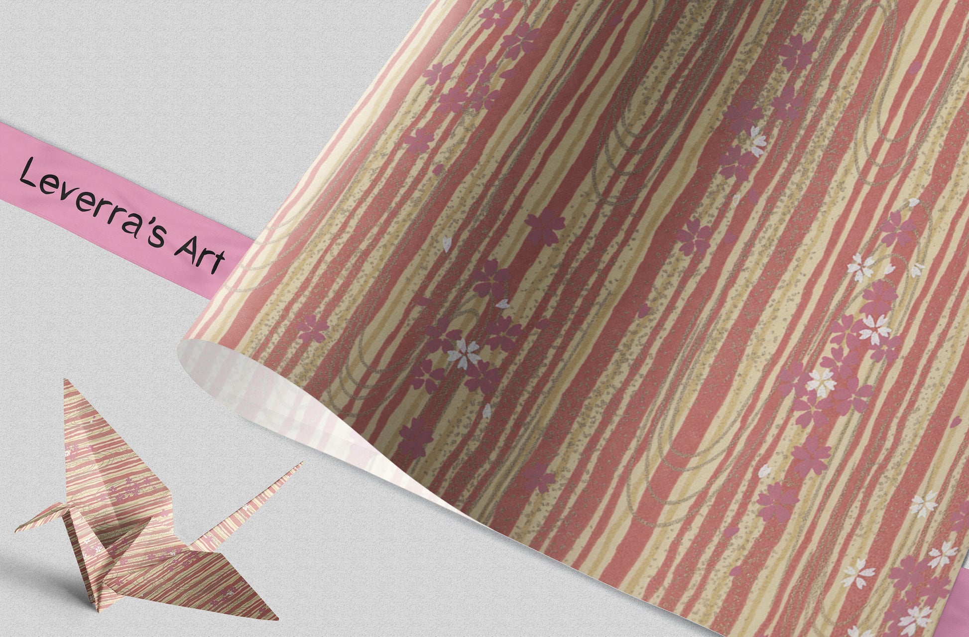 Decorative chiyogami paper with floral pattern and a crafted paper crane on a light gray background, featuring 'Leverra's Art' branding and a folded paper crane.