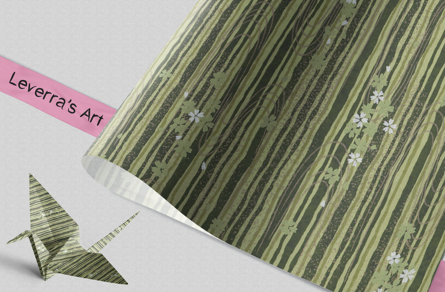 Green patterned chiyogami paper with floral design and 'Leverra's Art' label, featuring an origami crane.