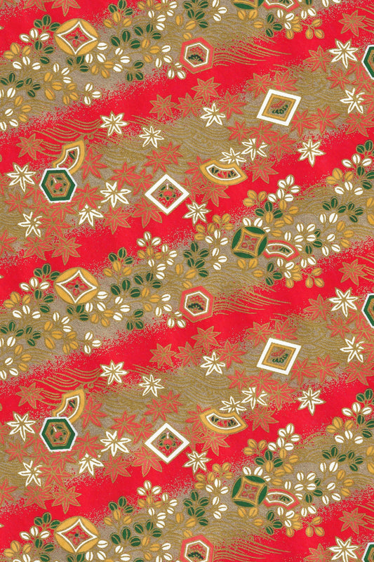 Decorative chiyogami paper with geometric patterns on a red background
