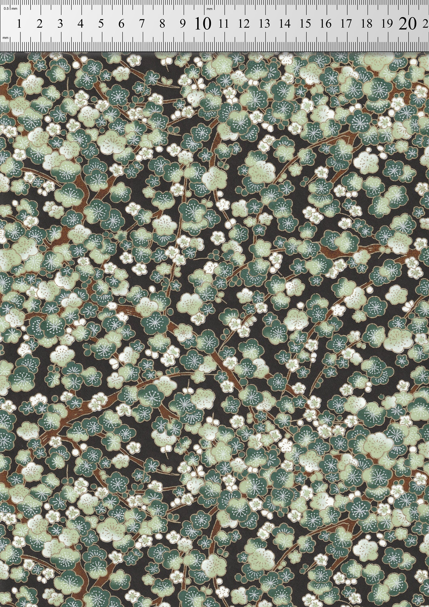 Floral pattern chiyogami paper with a ruler at the top for scale