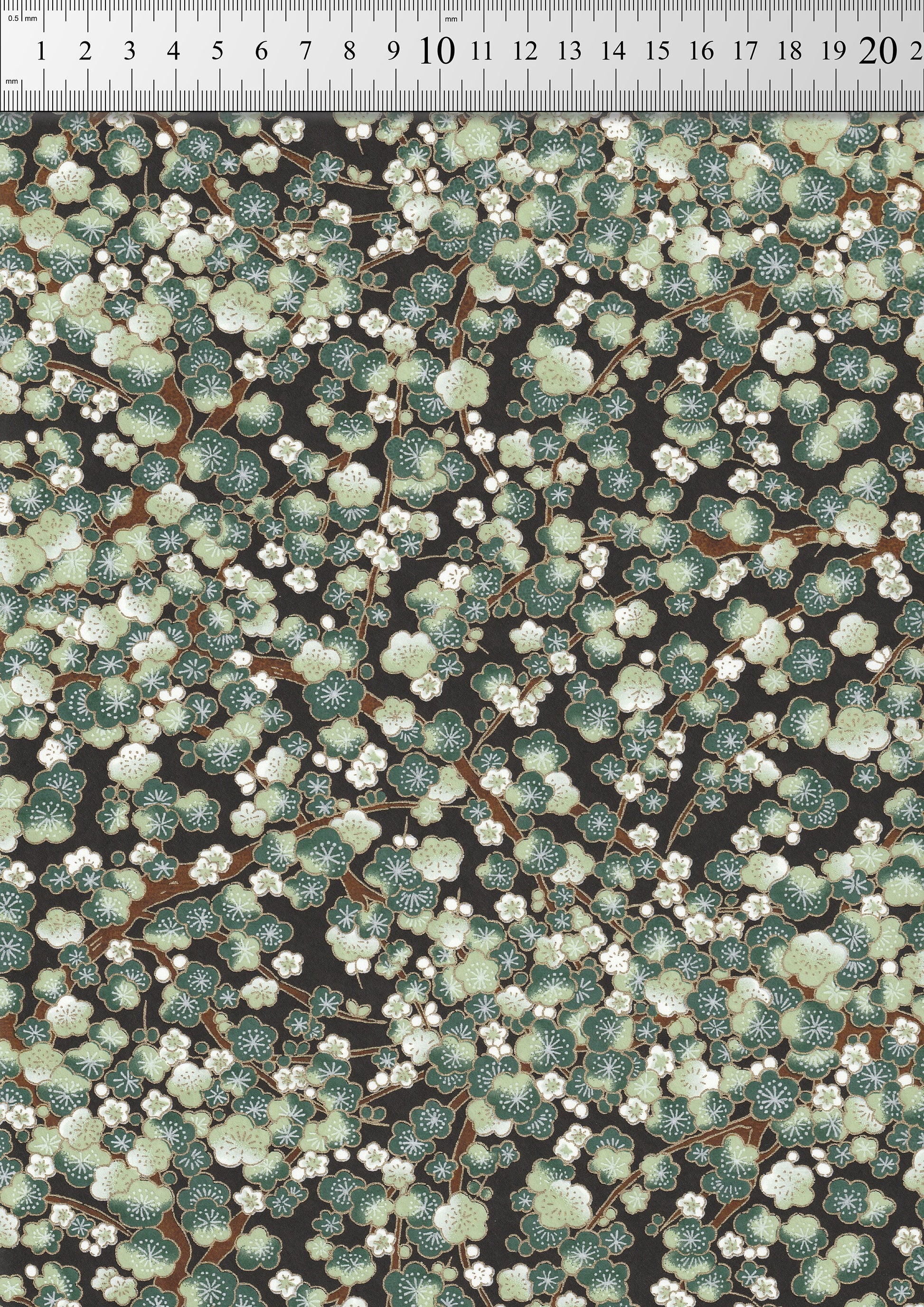 Floral pattern chiyogami paper with a ruler at the top for scale