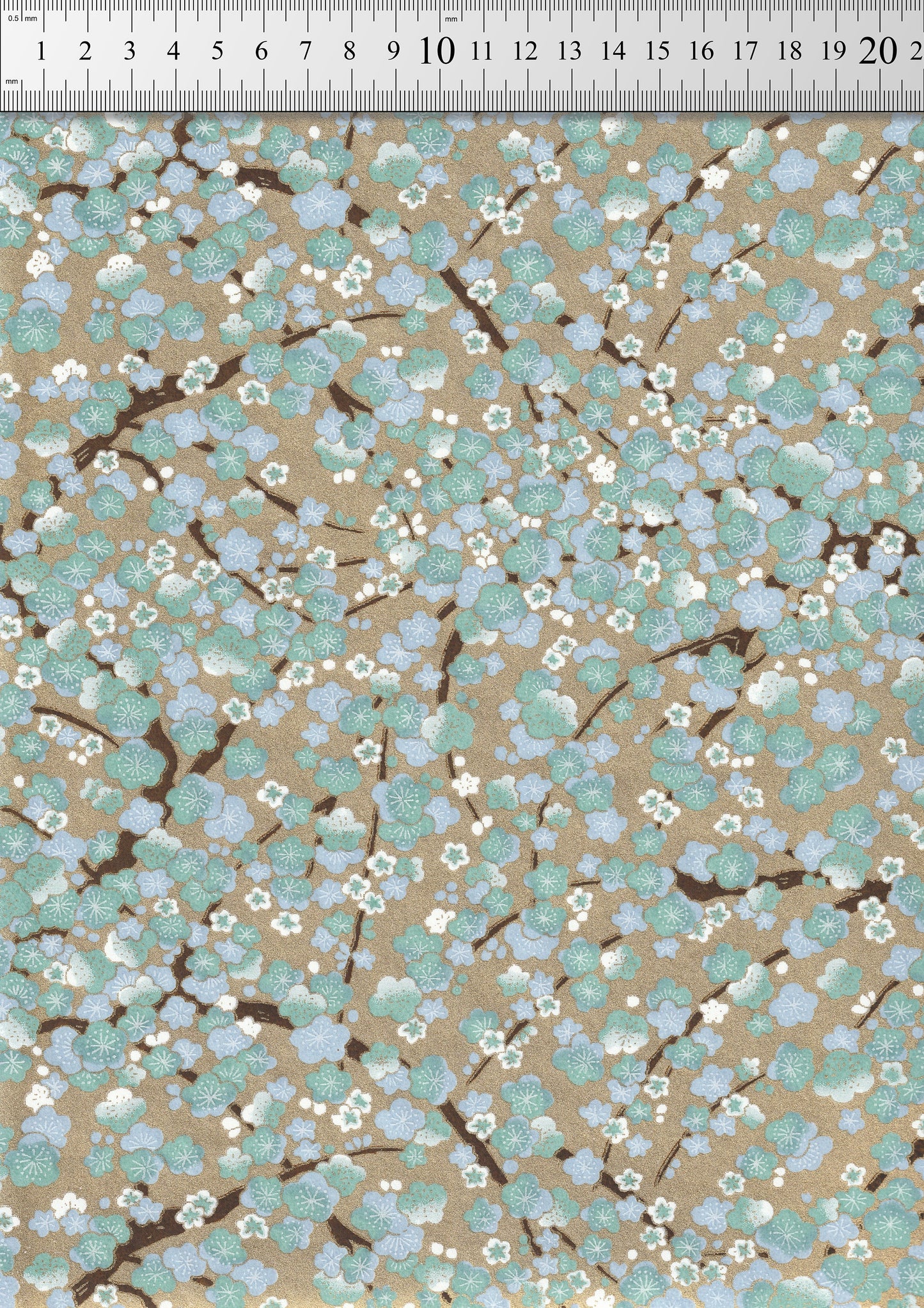 Floral patterned chiyogami paper with a ruler at the top for scale.
