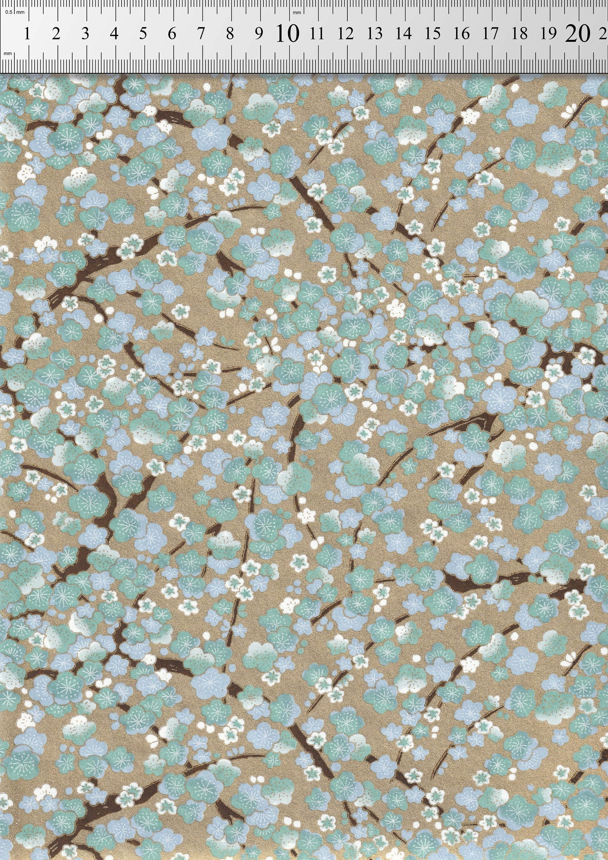 Floral patterned chiyogami paper with a ruler at the top for scale.