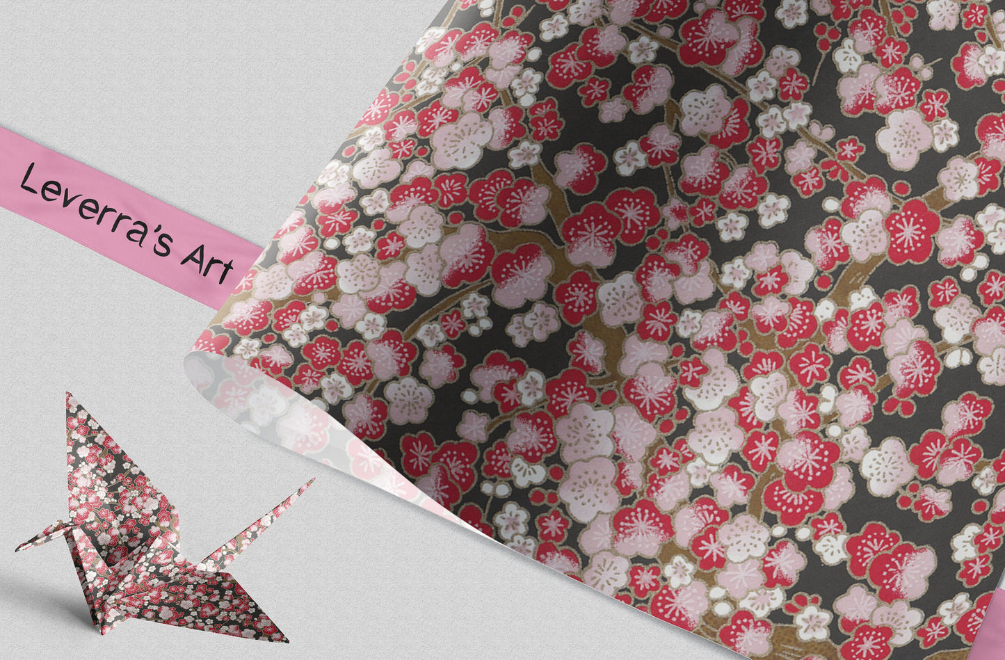 Floral patterned chiyogami paper with a pink origami crane on a gray background, featuring 'Leverra's Art' branding.