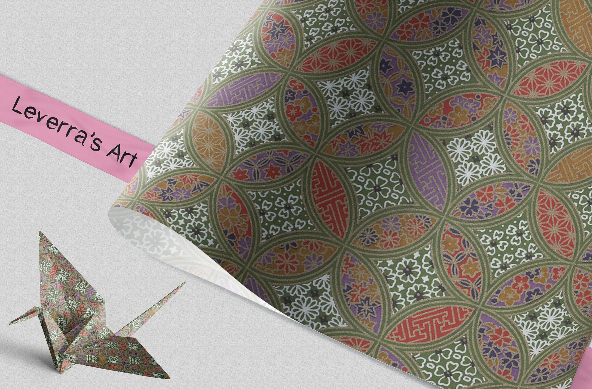 Patterned chiyogami paper with an origami crane and a pink strip labeled 'Leverra's Art' on a light gray background.