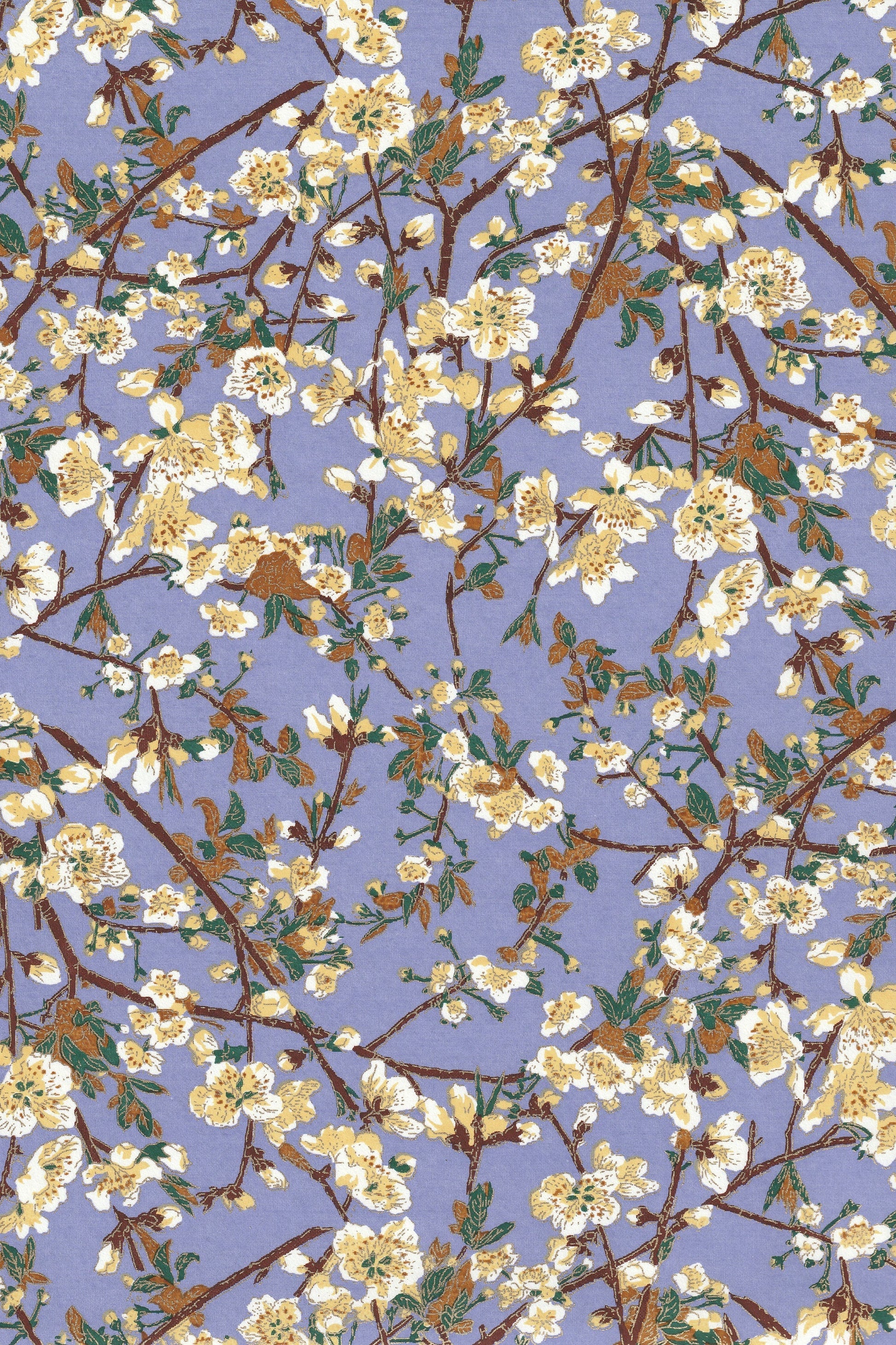 Chiyogami paper with Floral pattern with white flowers and green leaves on a blue background