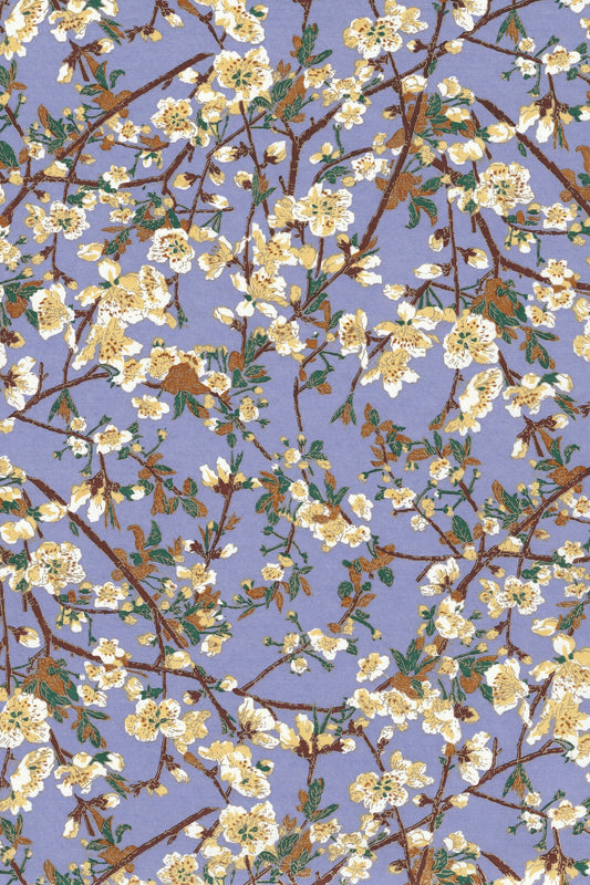 Chiyogami paper with Floral pattern with white flowers and green leaves on a blue background