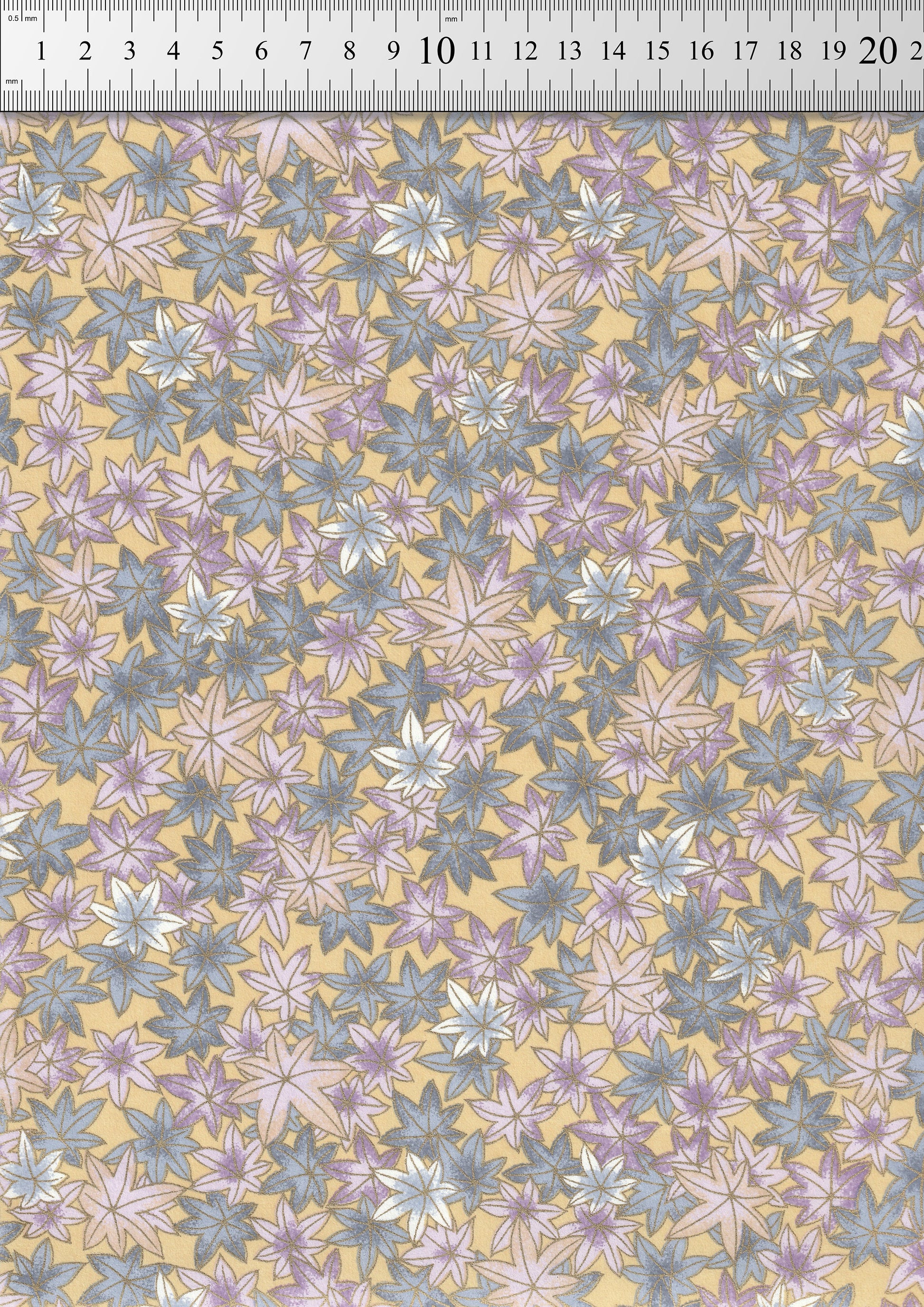 Floral pattern chiyogami paper with a ruler at the top for scale