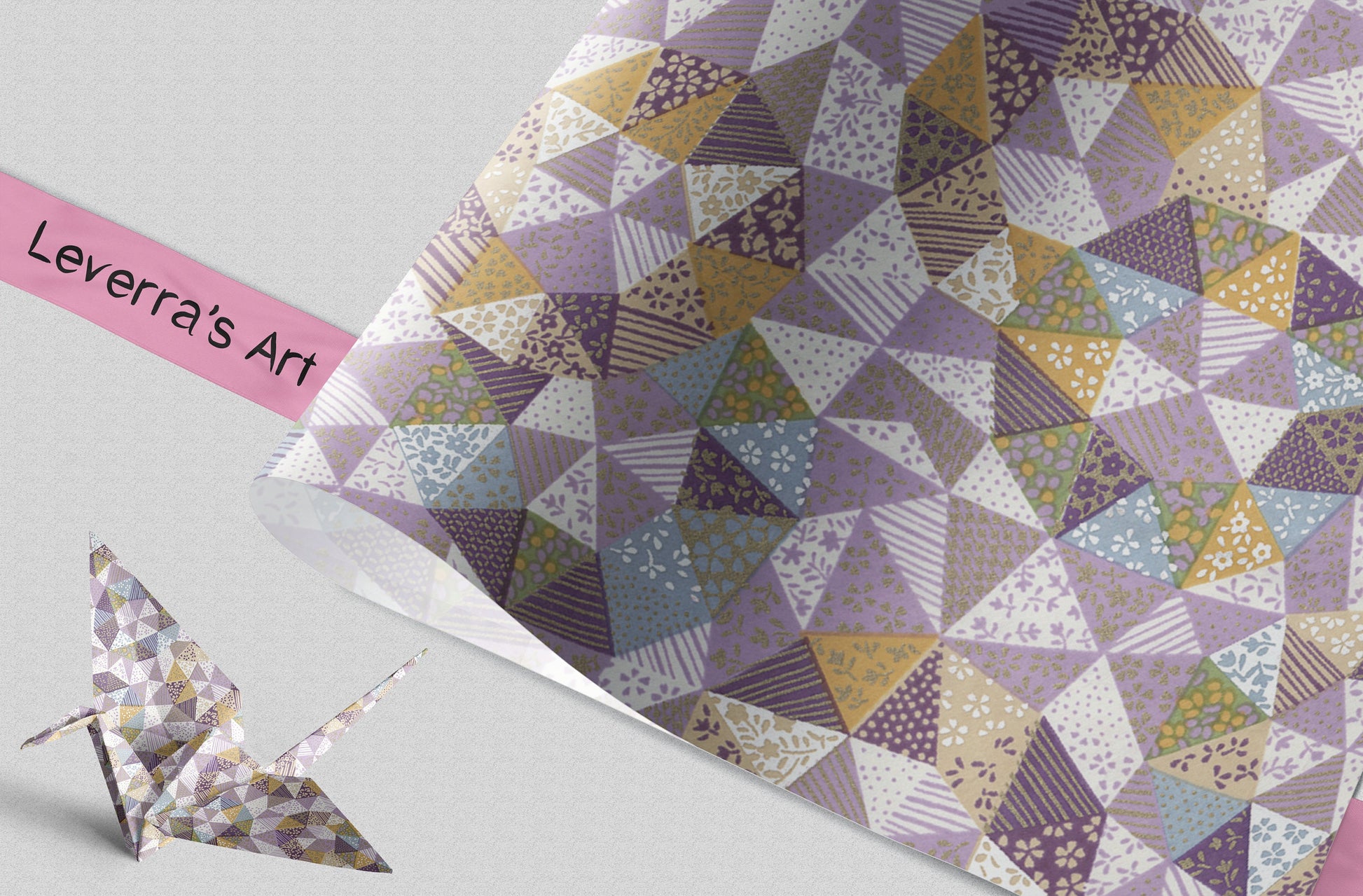 Patterned chiyogami paper with geometric design and a paper crane on a light gray background