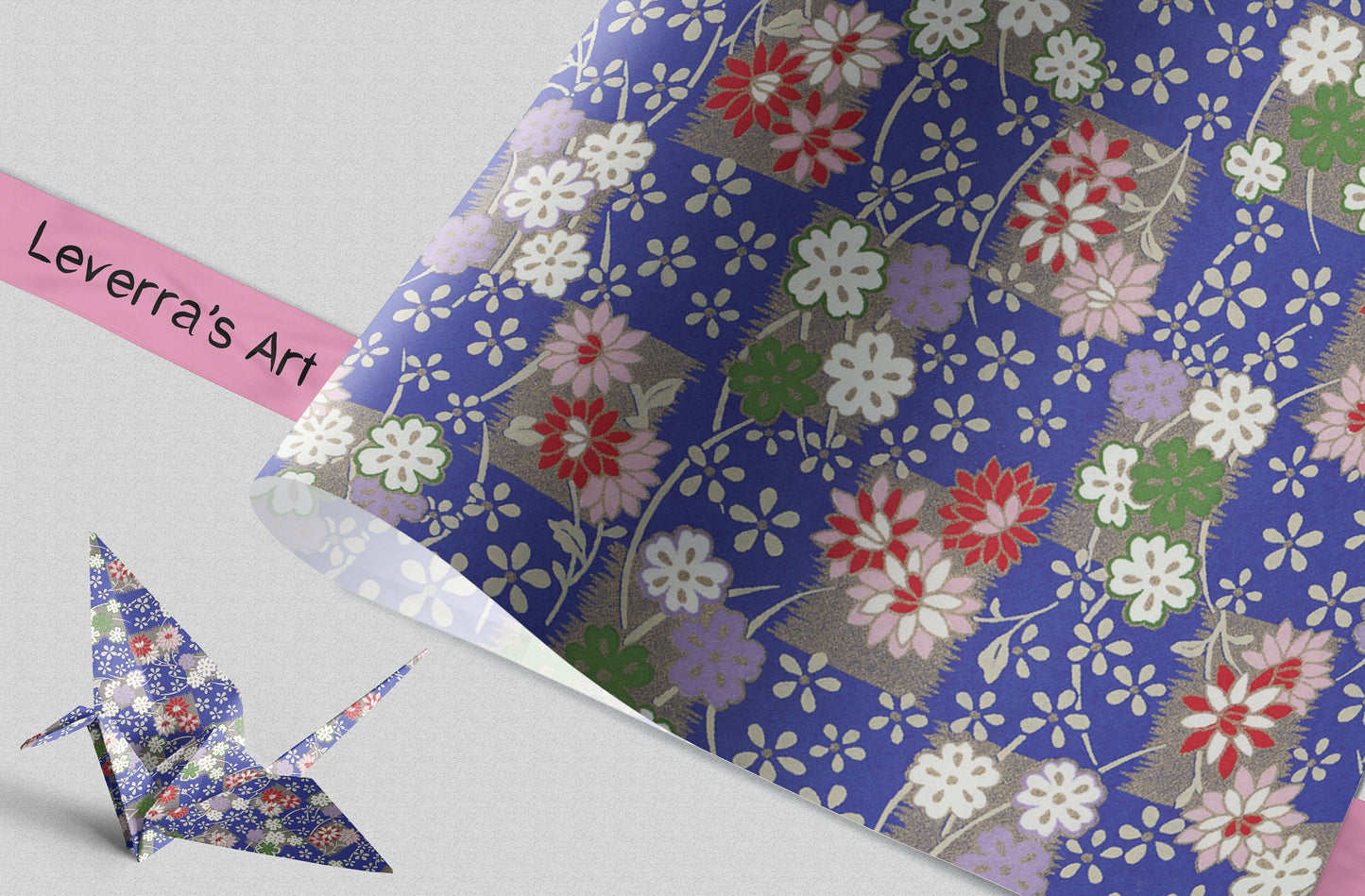 Floral-patterned chiyogami paper with an origami crane on a gray background, featuring 'Leverra's Art' branding.