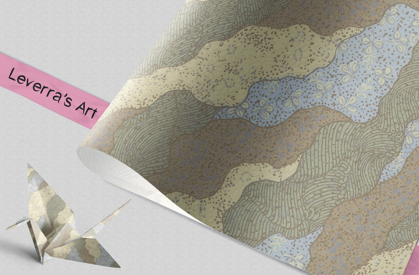 Decorative chiyogami paper with a textured landscape design and an origami crane on a light gray background featuring a "Leverra's Art" label.