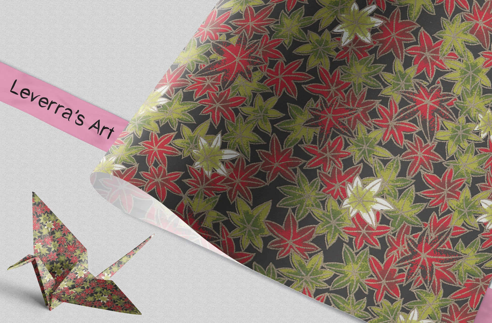 Floral-patterned paper with a paper crane and a pink tag labeled 'Leverra's Art' on a light gray background.
