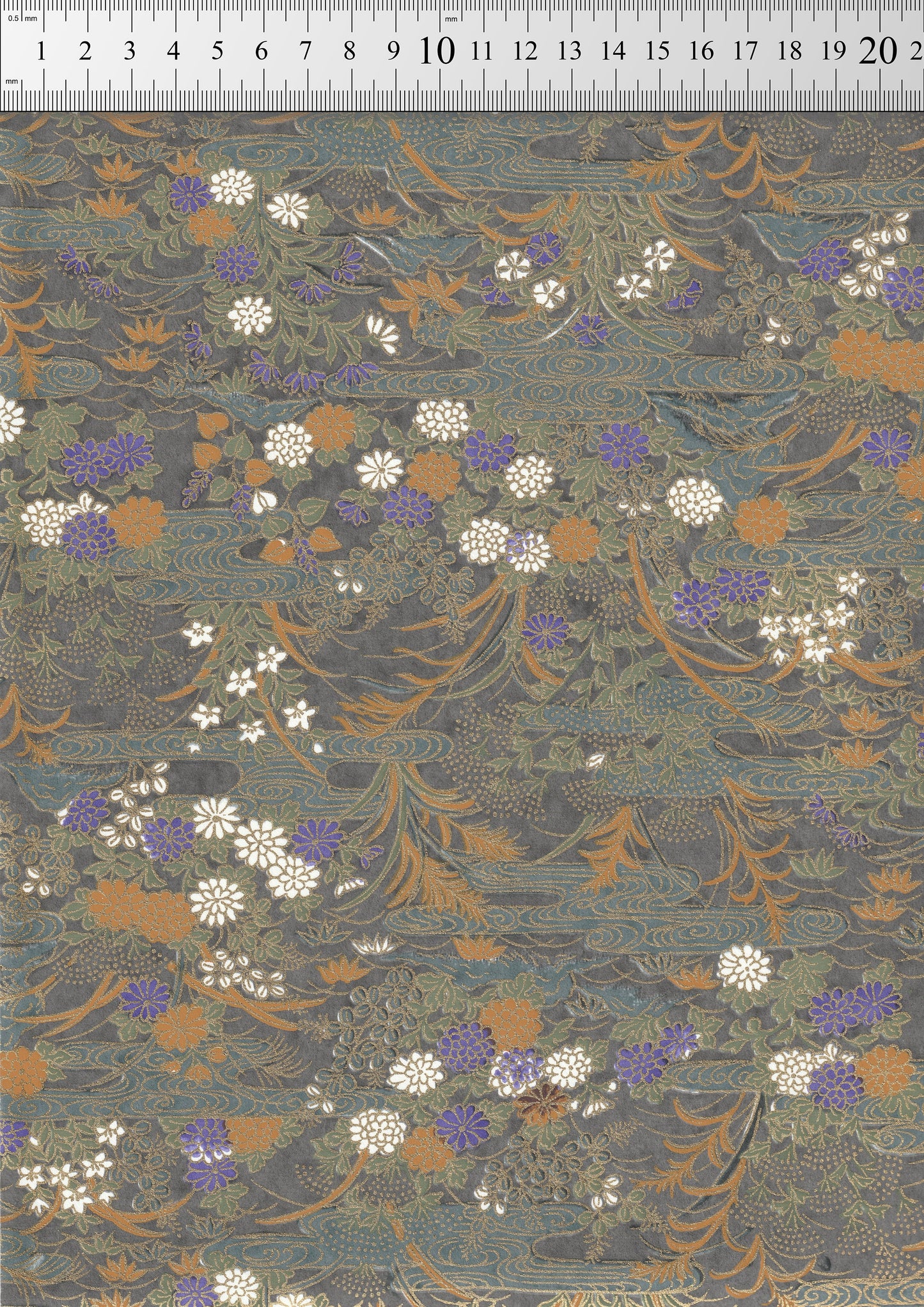 Floral patterned chiyogami paper with a ruler at the top for scale.