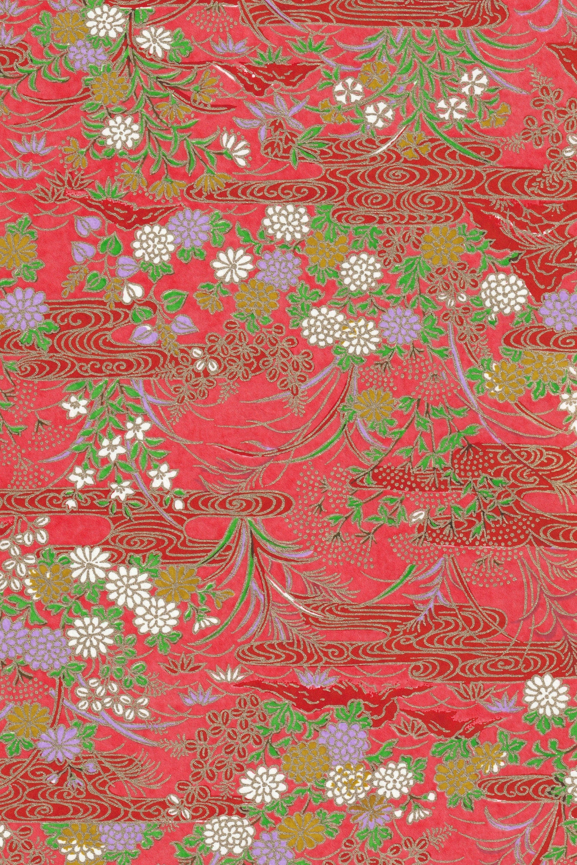 Chiyogami paper with floral pattern on red background