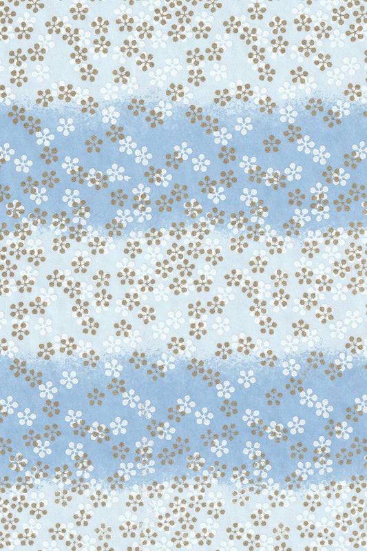 Floral patterned chiyogami paper with small flowers on a blue and white background