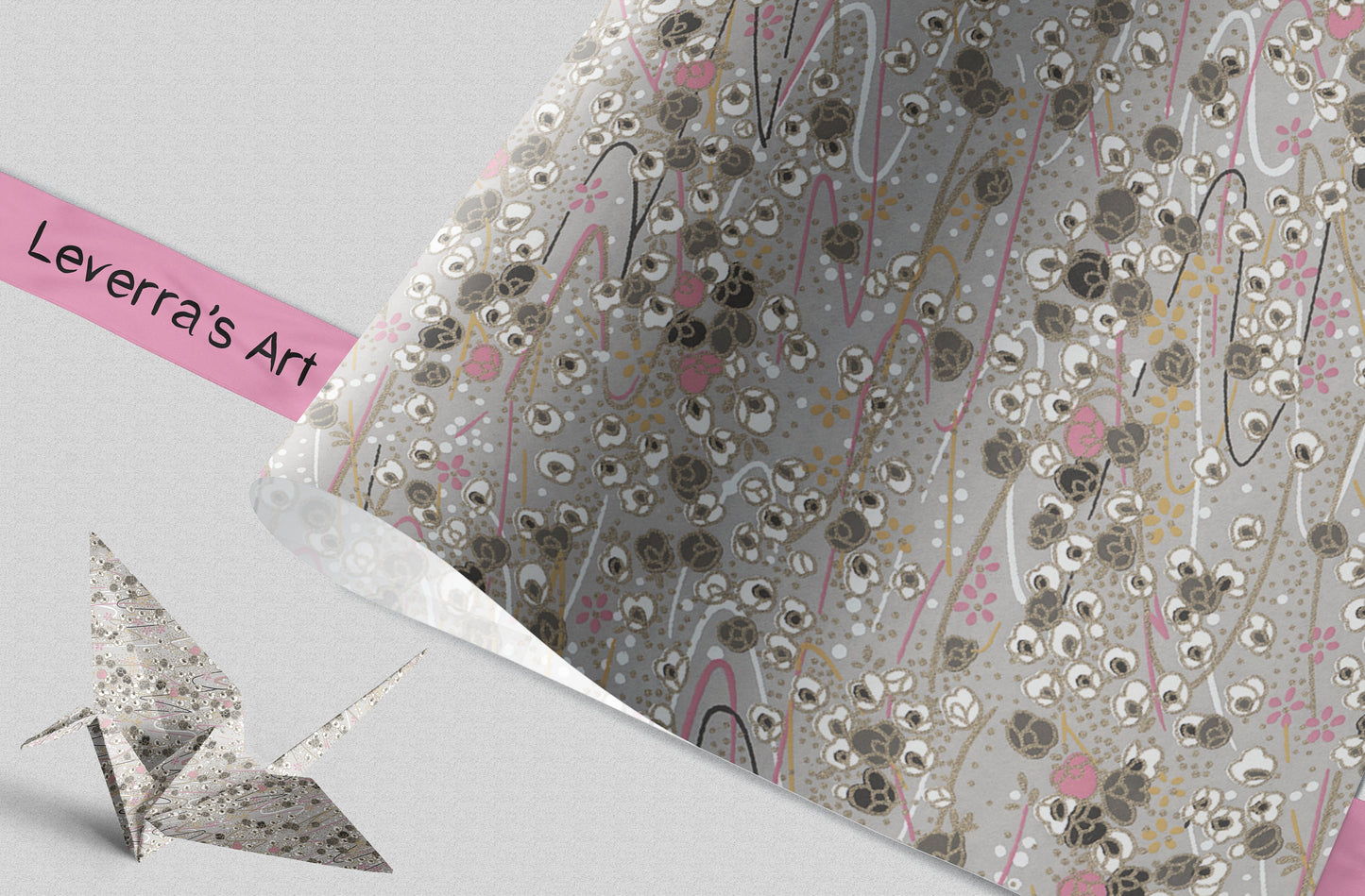 Decorative paper with floral pattern and 'Leverra's Art' branding, featuring a small origami crane.