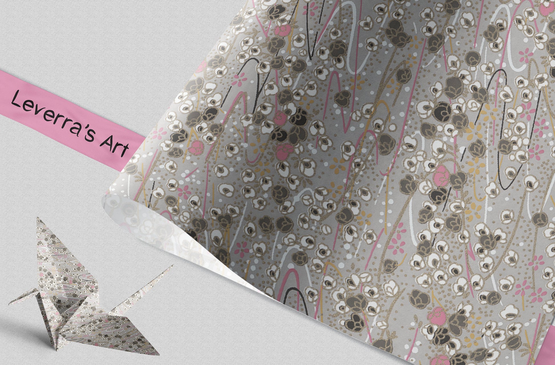 Decorative paper with floral pattern and 'Leverra's Art' branding, featuring a small origami crane.