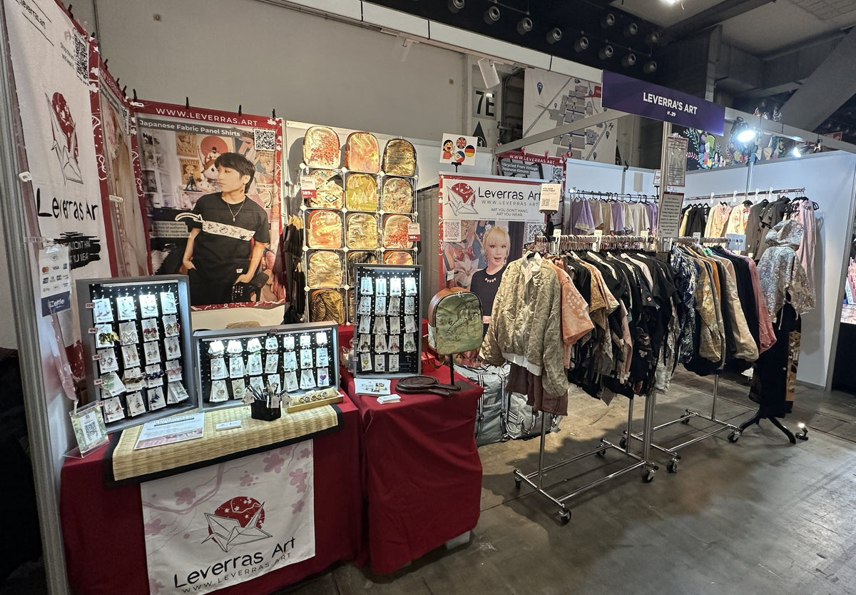Leverras Art convention booth with origami earrings, obi backpacks and upcycled kimono jackets