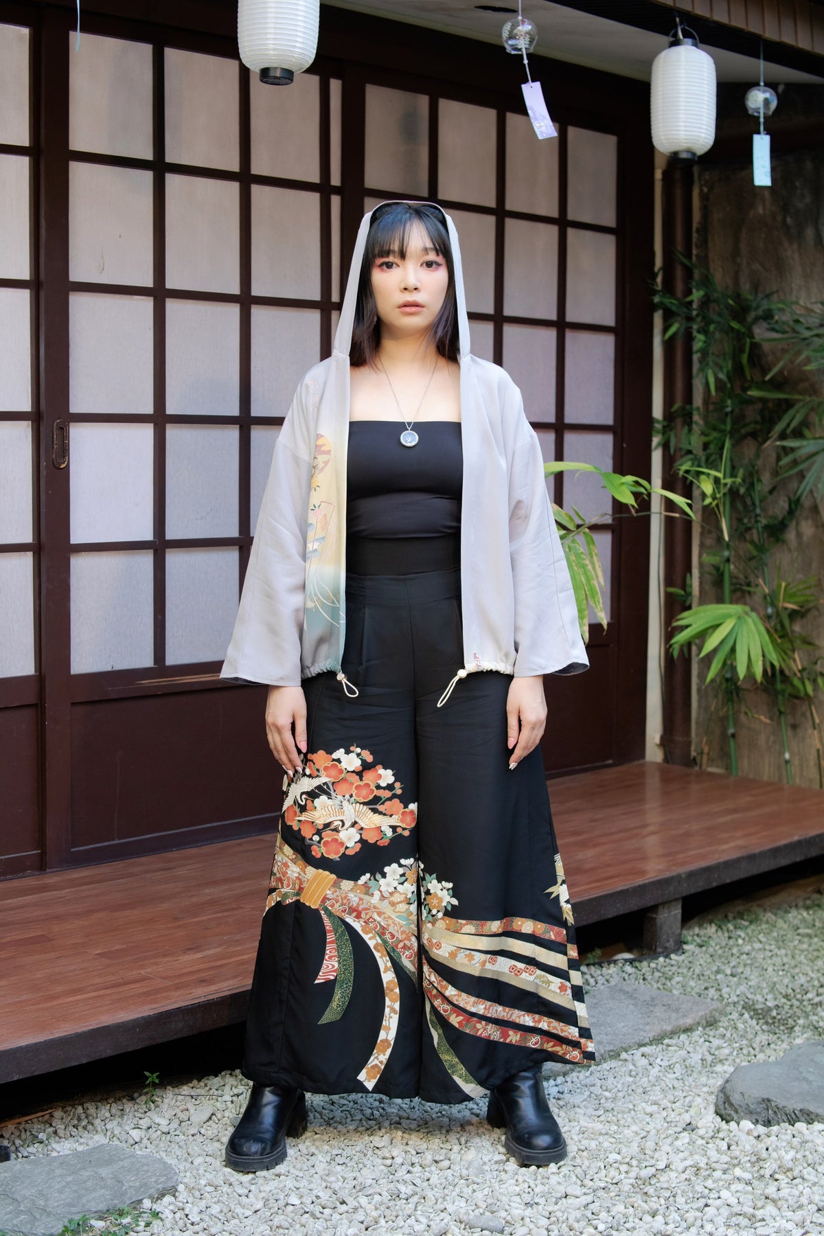 Model wearing Leverras Art upcycled kimono palazzo pants with a hooded kimono jacket